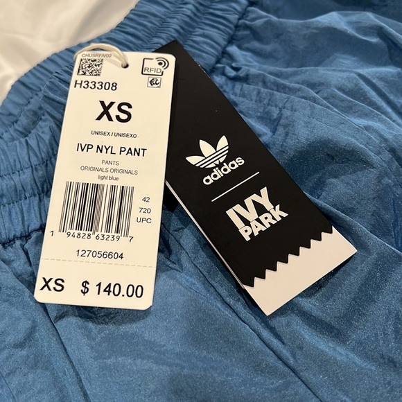 Brand new Adidas ivy park nylon track pants this have a bag you're fat - Picture 6 of 6